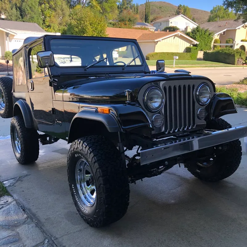 A Jeep CJ detailed on a driveway in Thousand Oaks, CA
