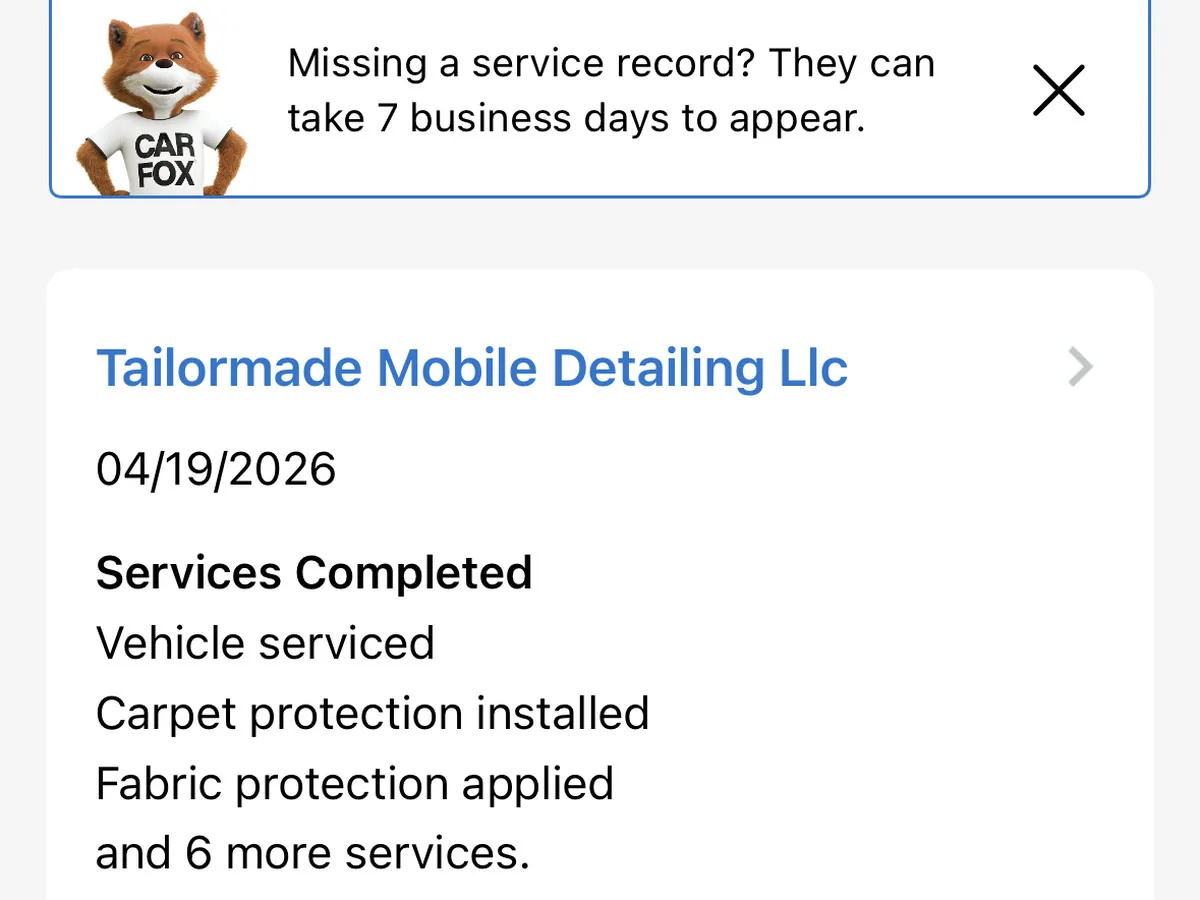 A CARFAX service record showing a completed detailing service logged against a vehicle