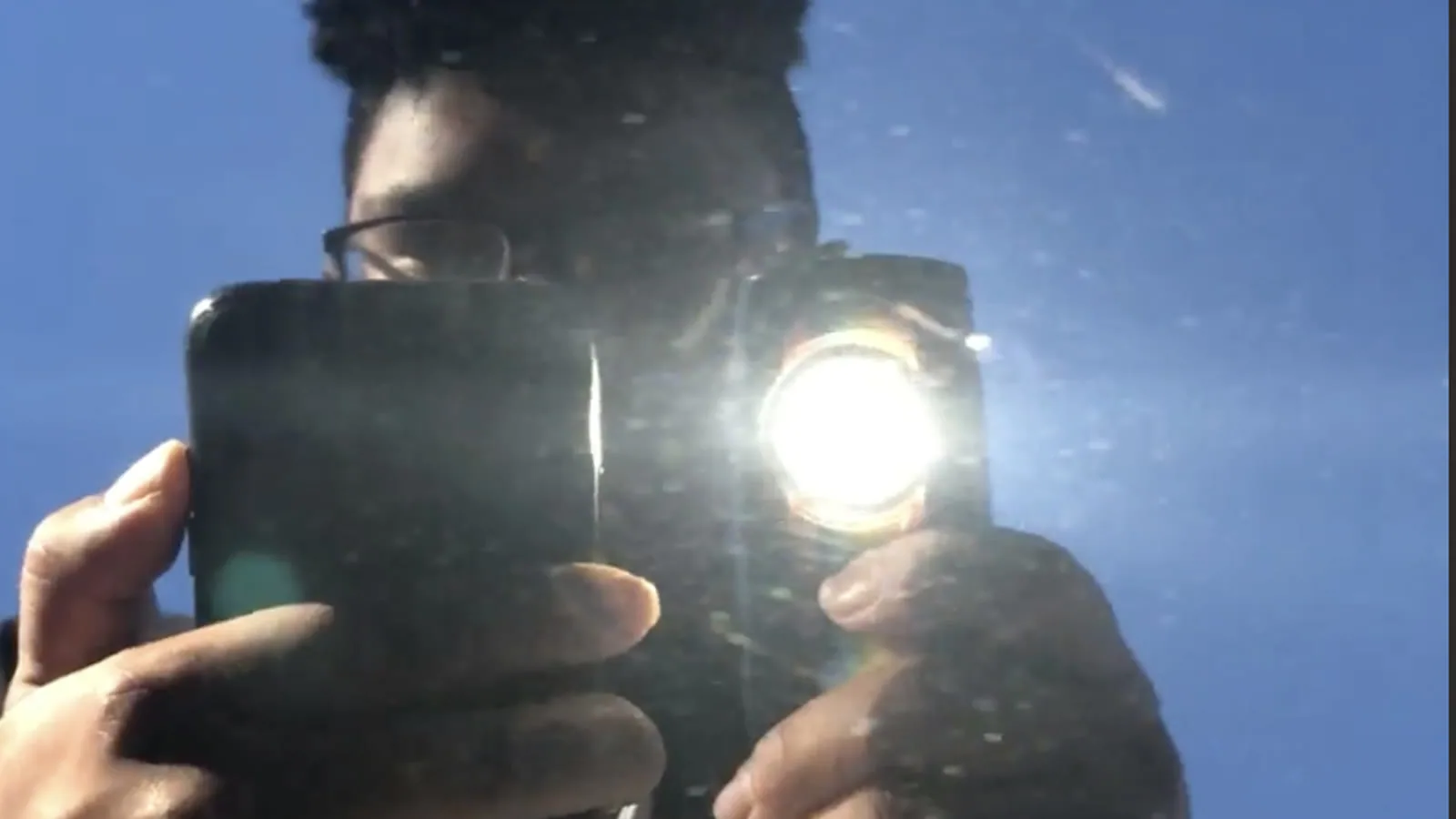 The same work light after correction, the beam a tight point and the reflection sharp
